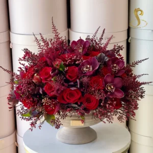 SP Red Velvet by Sweetspetals USA, a luxurious floral arrangement featuring deep red roses and lush petals, perfect for romantic occasions and elegant home decor.