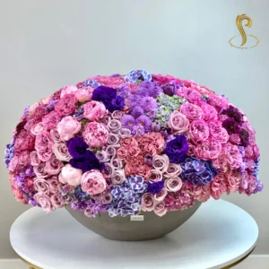 SP Queen of the World Extra Grandiose by Sweetspetals USA, a luxurious floral arrangement featuring premium roses and exotic blooms, perfect for grand celebrations and elegant decor.