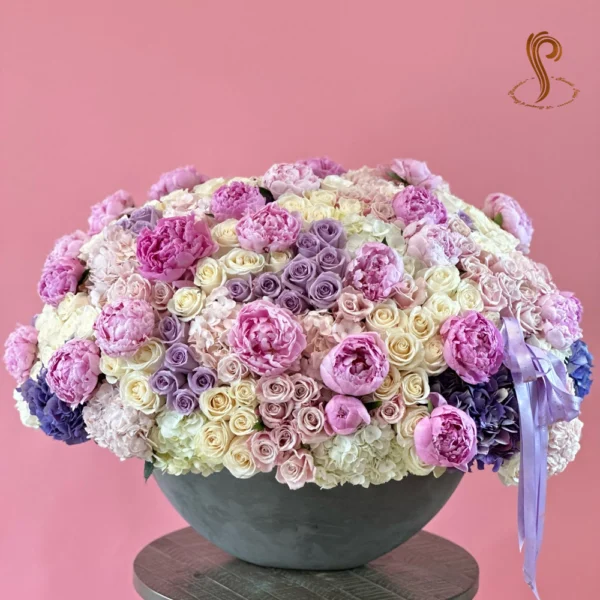 SP Opulent Pink & Lavender Bliss by Sweetspetals USA, a luxurious floral arrangement featuring a blend of pink roses, lavender blooms, and orchids, perfect for weddings, anniversaries, or elegant home decor.