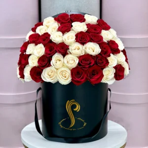 Elegant Signature Red and White Rose Box by Sweets Petals, featuring a beautiful arrangement of fresh red and white roses, perfect for any romantic occasion.